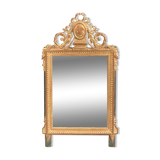 Louis XVI style mirror in gilded wood