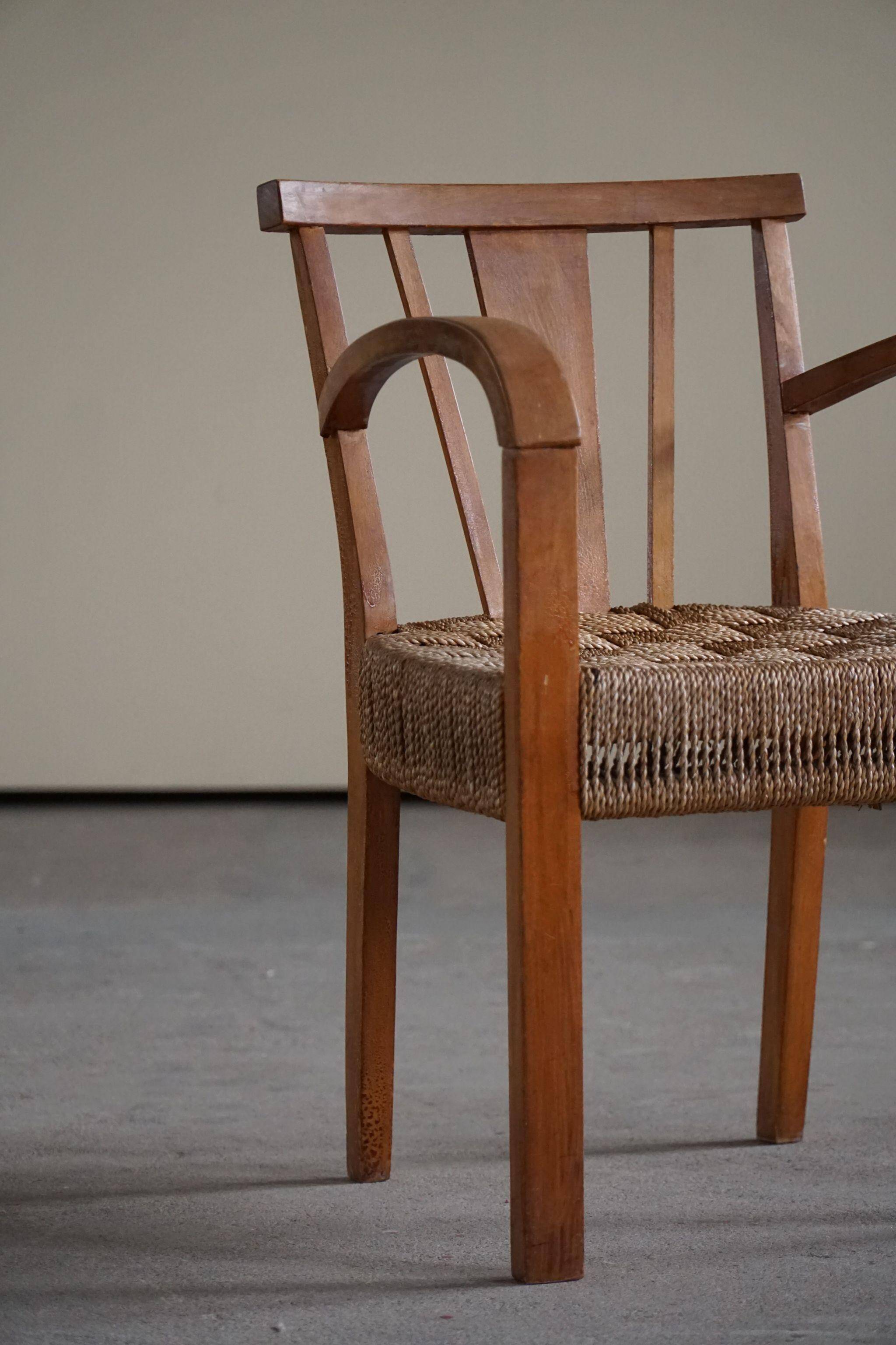 Modern Danish lounge chair in beech and paper cord, in the style of Frits Schlegel.