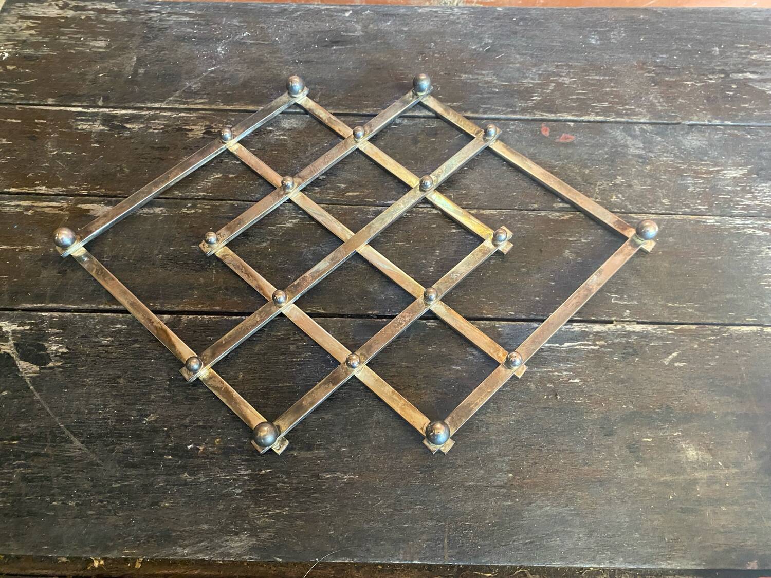 Dessous de plat ancien jacques adnet extensible métal argenté 1950 vin