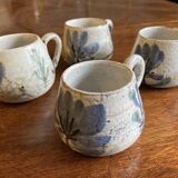 Ensemble de quatre tasses à café. Gustave Reynaud.