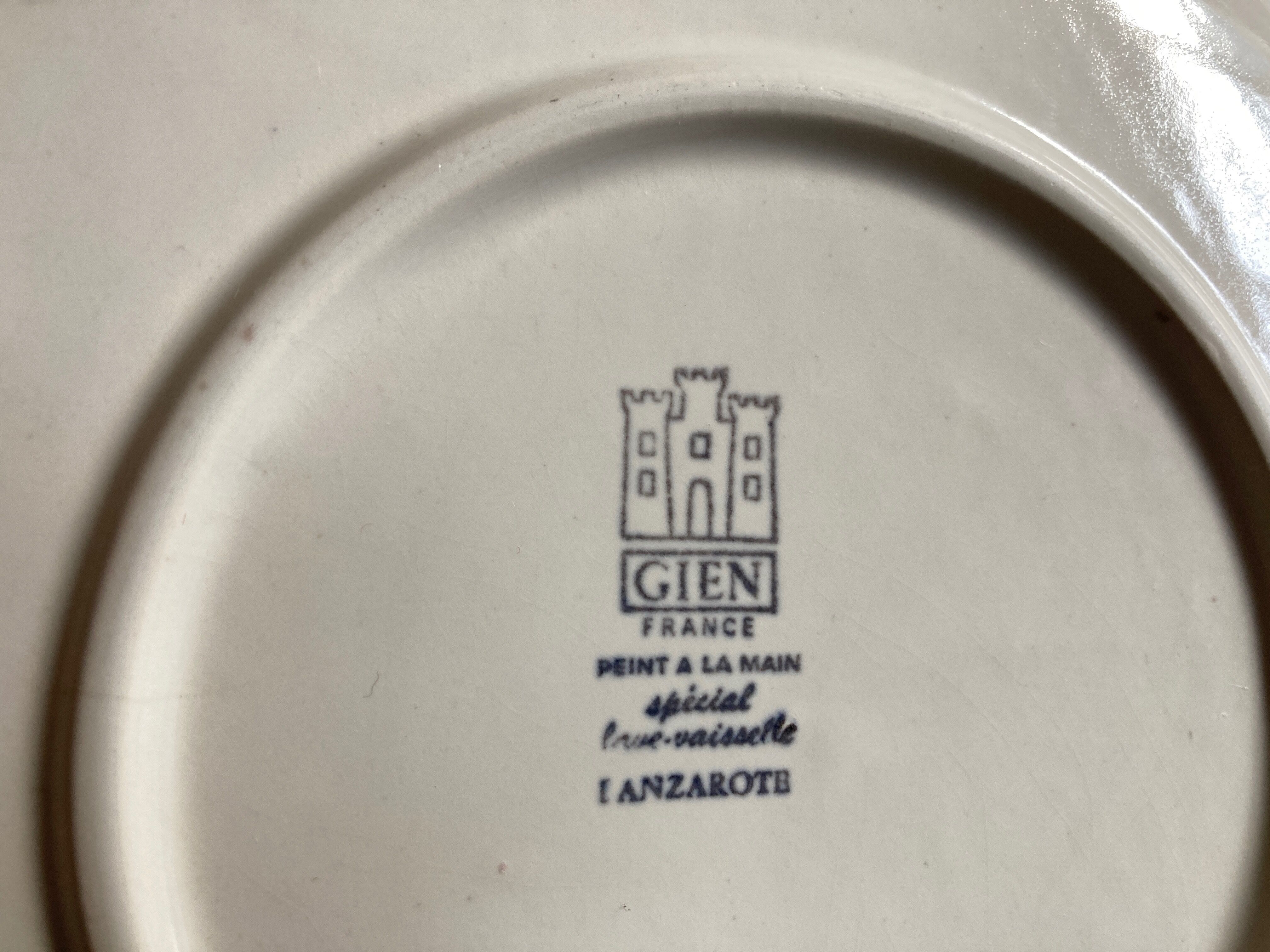 set of 7 plates 1970s faience of Gien Lanzarote sandstone decoration