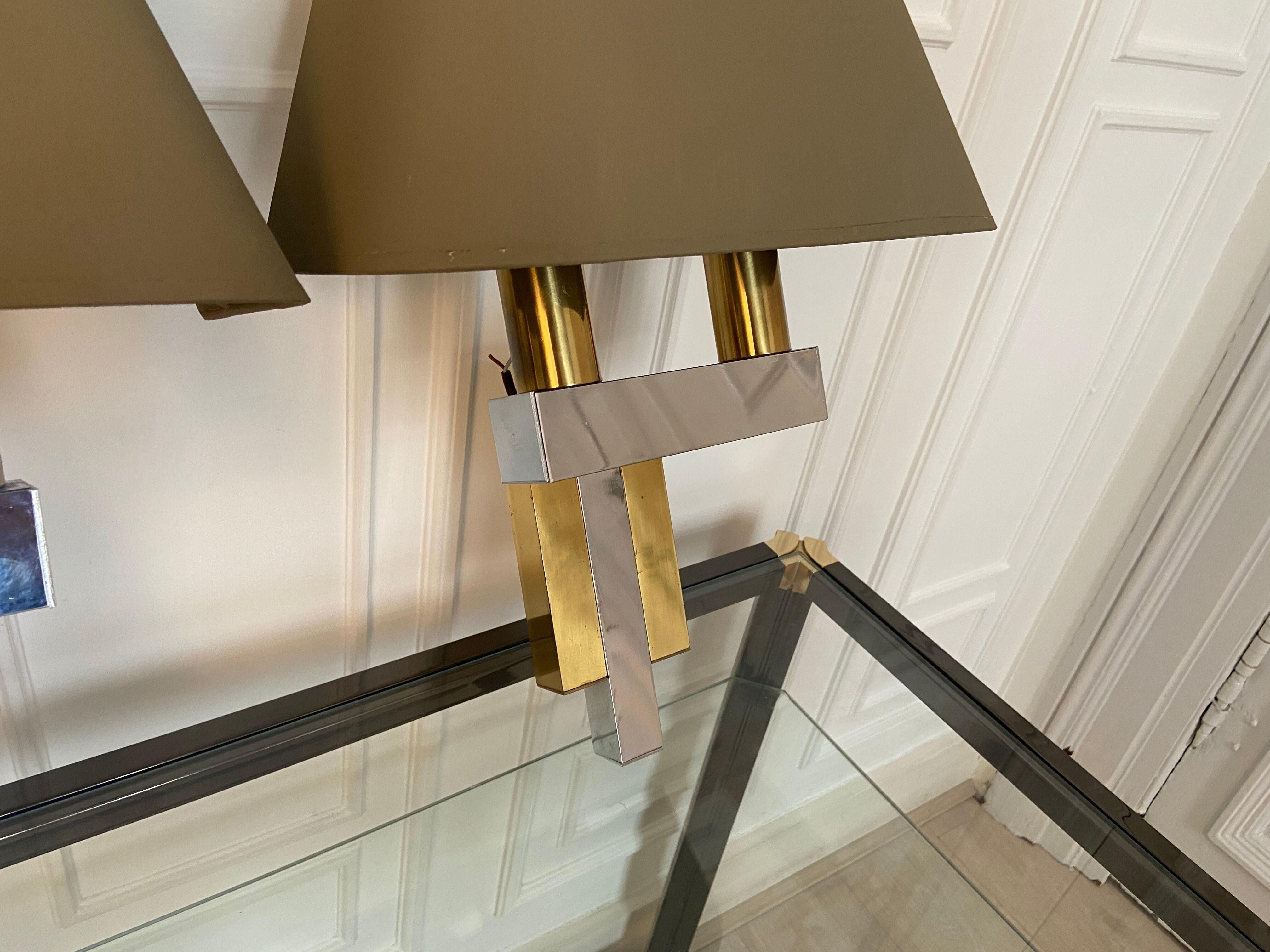 Pair of chrome and brass sconces, Italy, 1970s