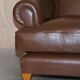Contemporary Howard & Sons style grand sofa with brass casters.