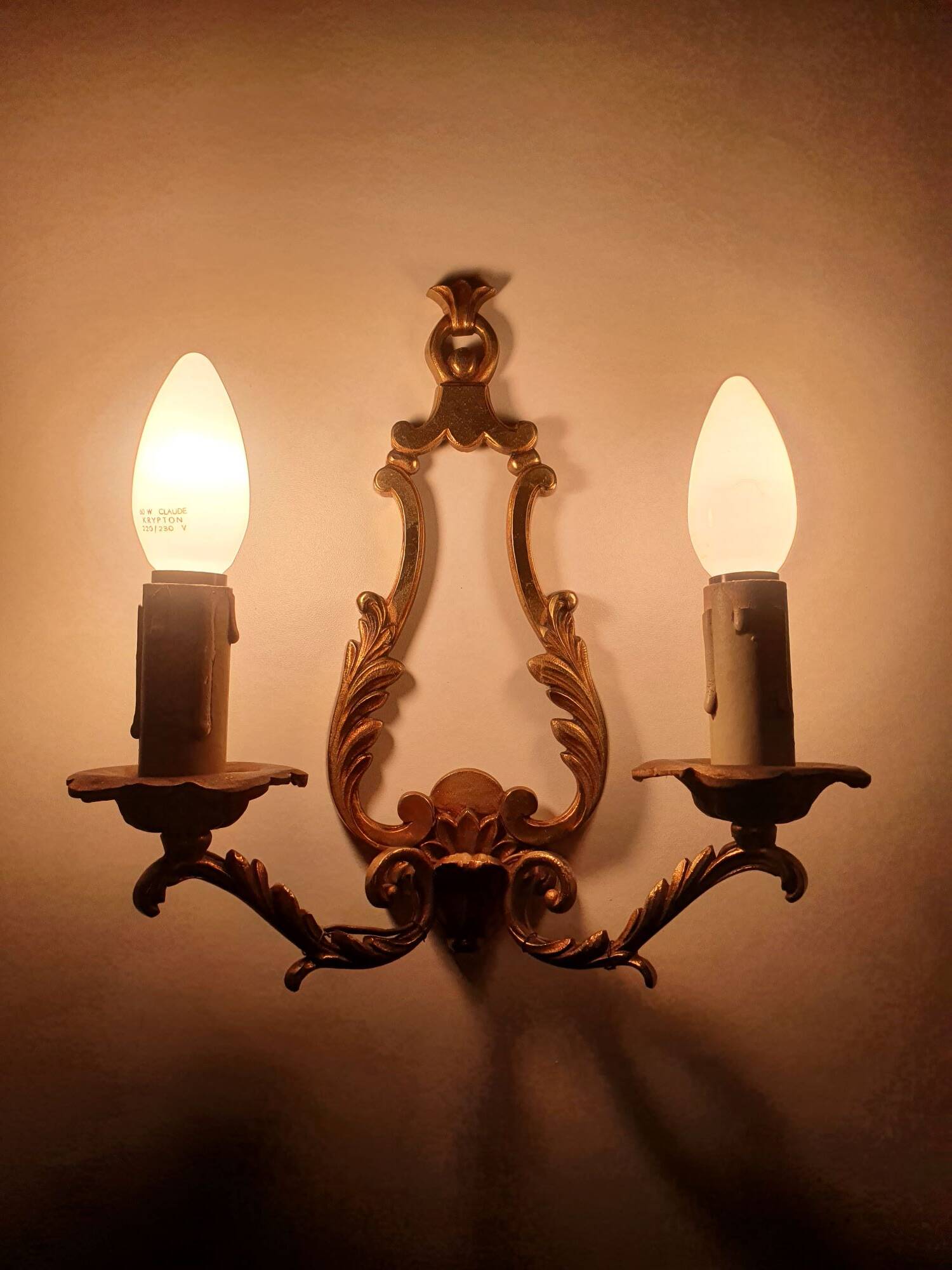 Pair of antique candlestick wall sconces