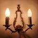 Pair of antique candlestick wall sconces