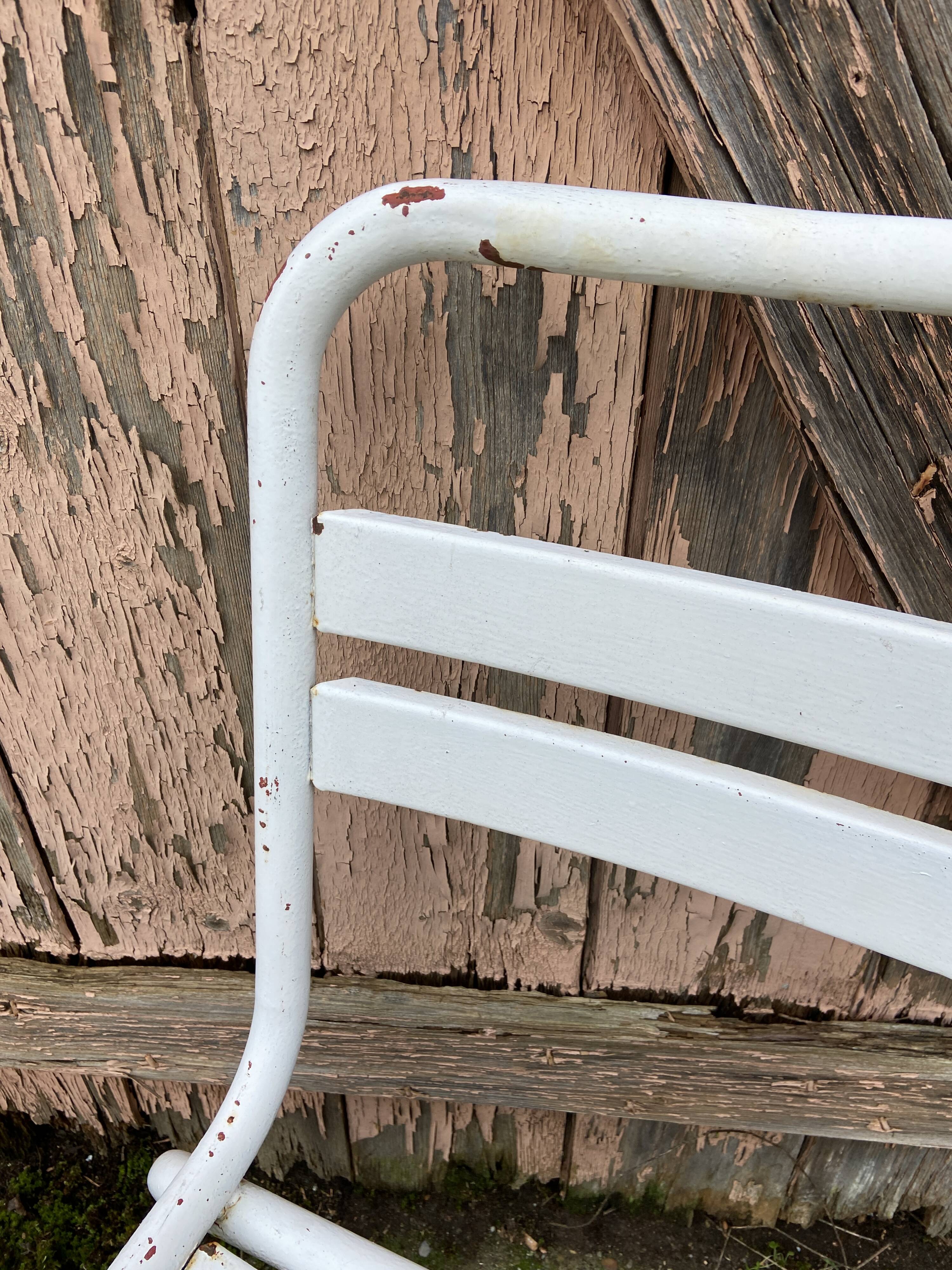 Duo of vintage metal Tolix chairs