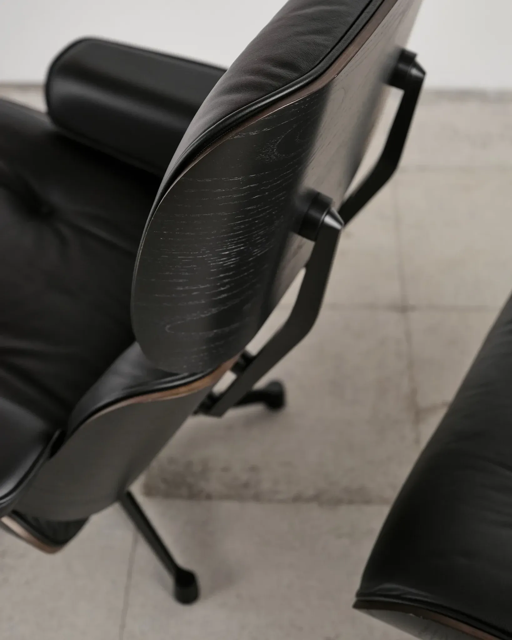Lounge Chair and ottoman in black leather by Charles & Ray Eames, Vitra
