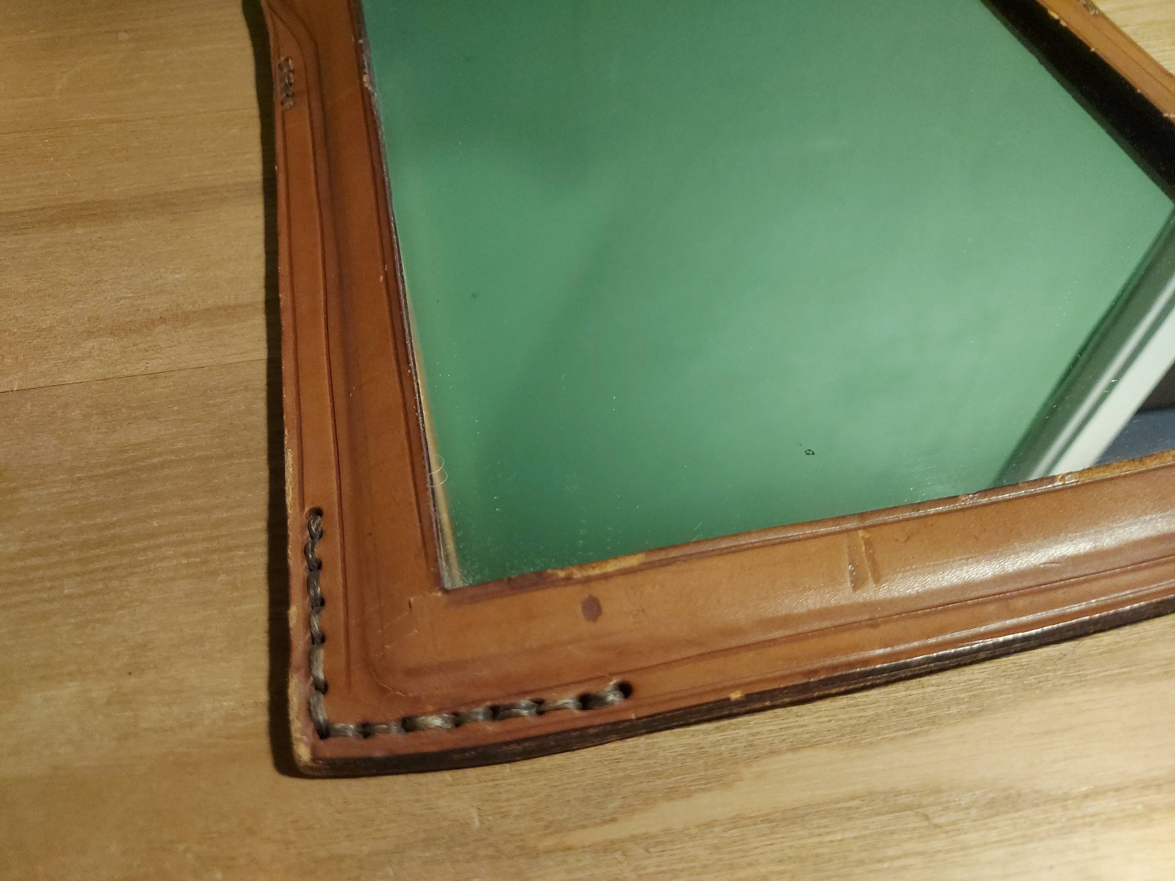 Vintage leather mirror