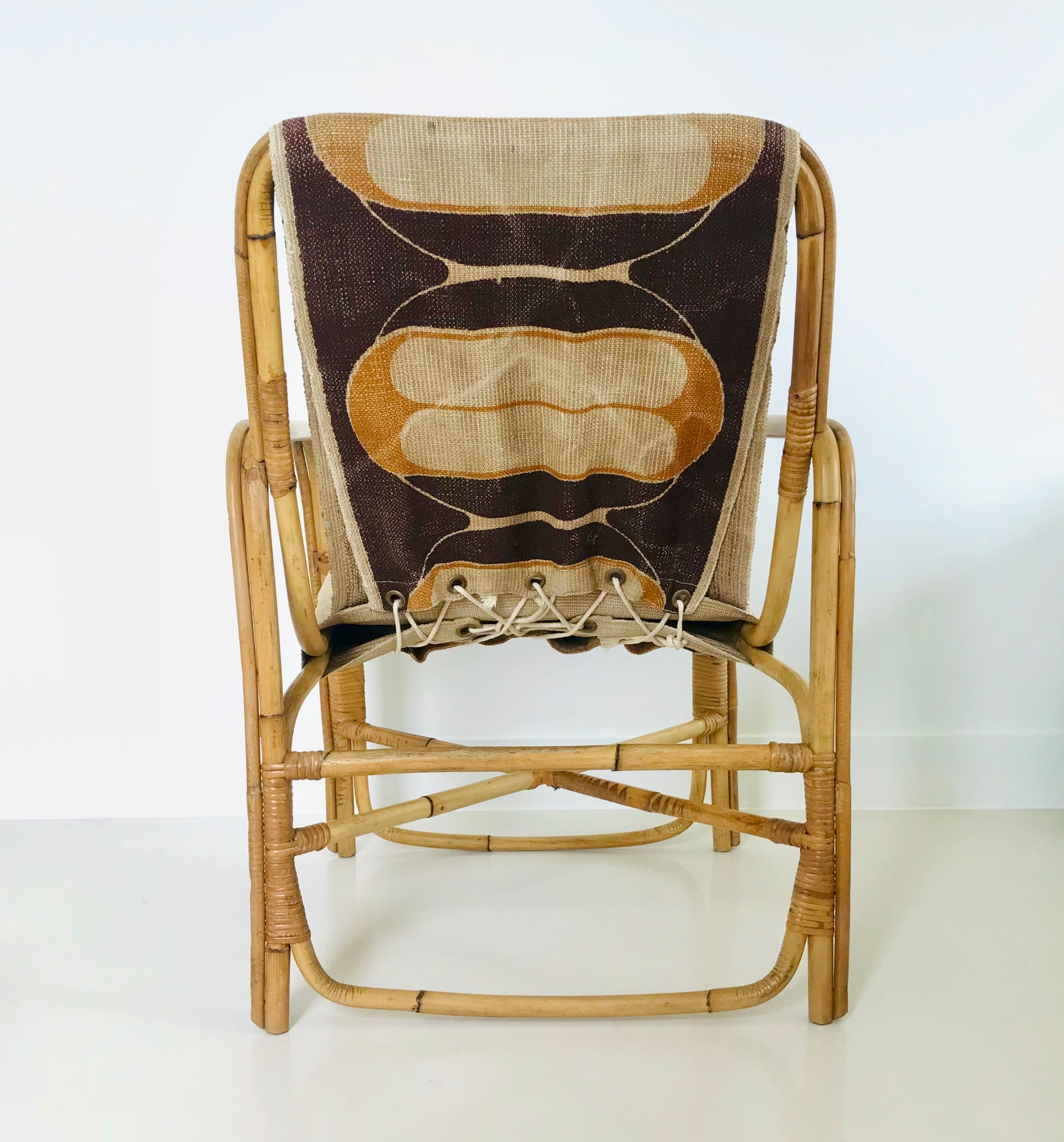 Rattan armchair and fabric, France 60s