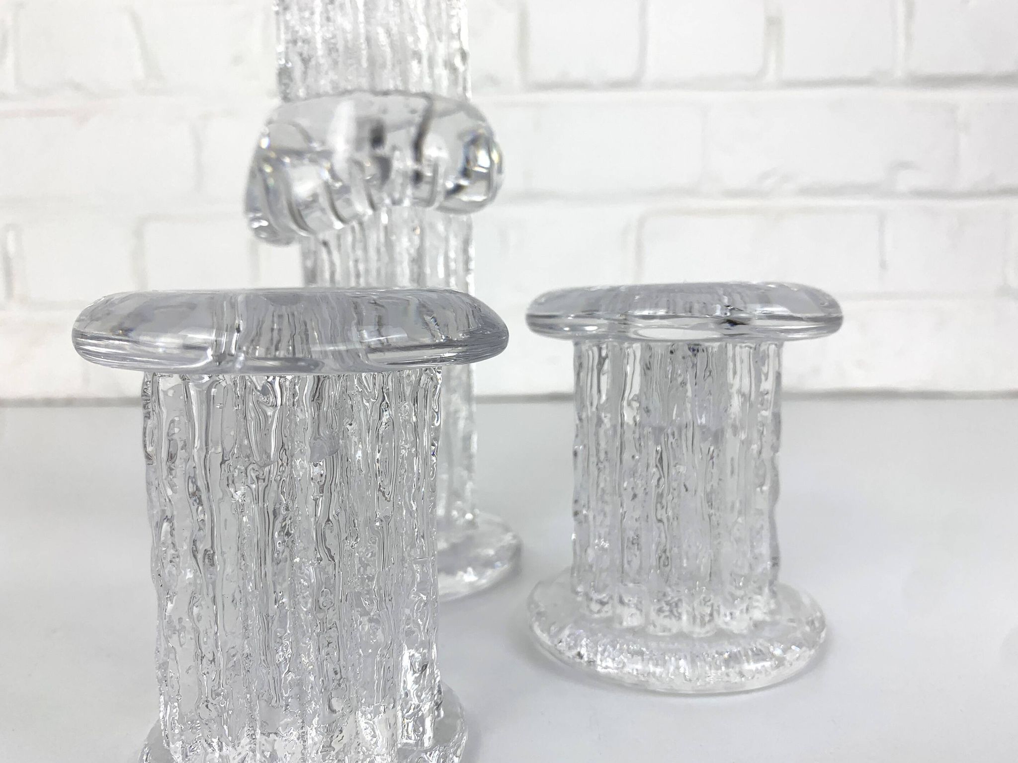 Glass candle holders by Göran Wärff for Kosta Boda, Sweden, 1970s.