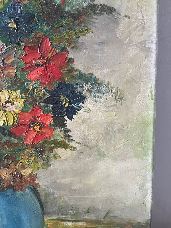 Bouquet de fleurs dans un vase bleu, signé