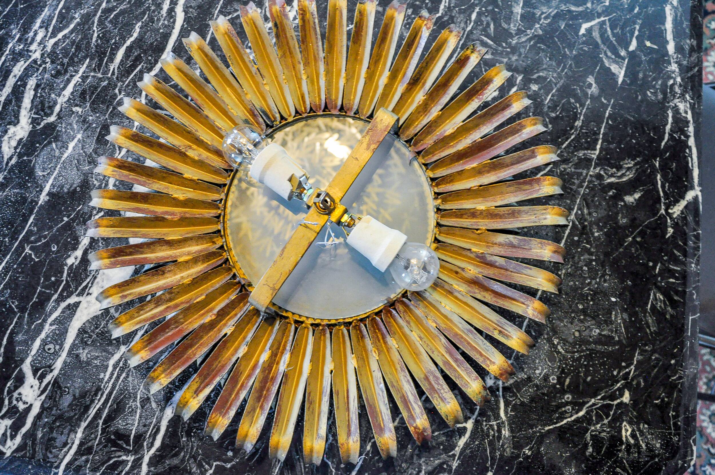 Sun wall lamp by ferro arte, metal and gold leaf, Spain, 1960