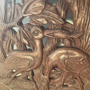 Chaise vintage à palabre en bois sculpté