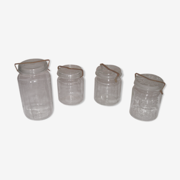 Set of 4 old jars with lids