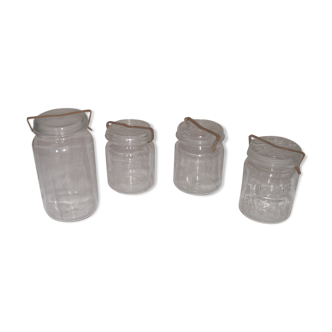 Set of 4 old jars with lids