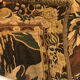 Tapestry decorated with a pink flamingo in a green landscape, woven by hand