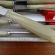 Lot 12 Art Deco style knives in case