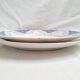 Round orange and blue plate HBCM and Creil and Montereau
