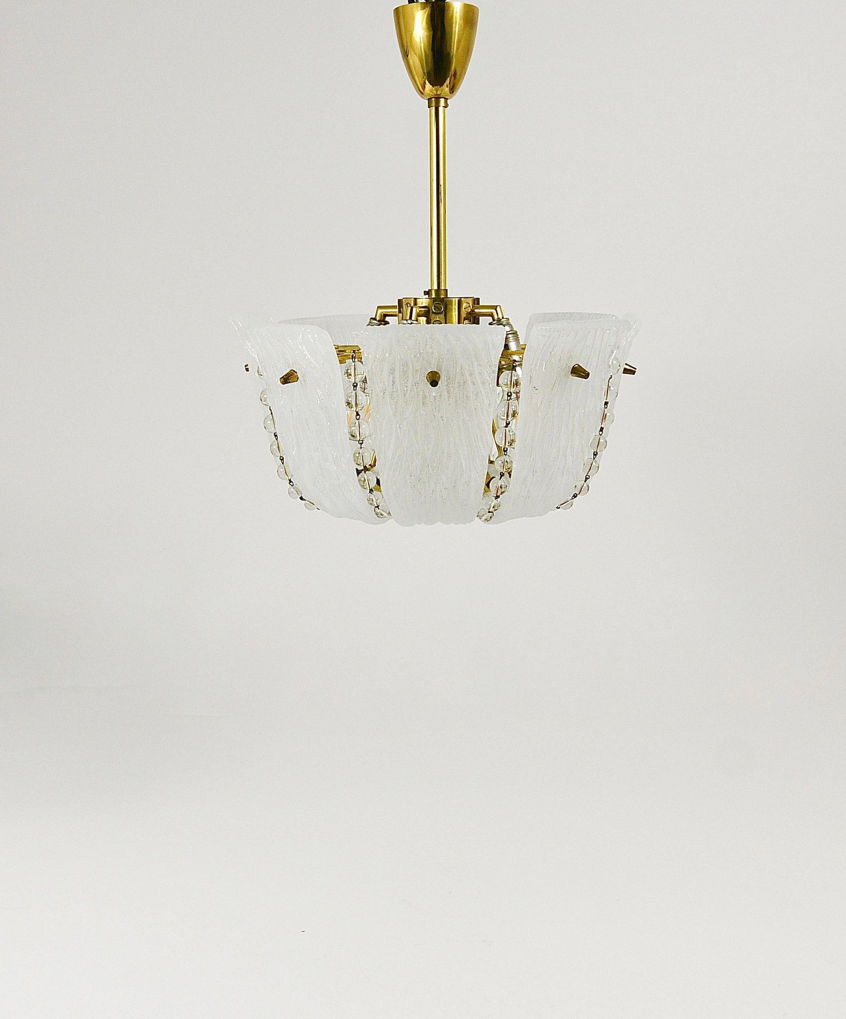 J.T. Kalmar Petite curved suspension basket, brass and glass, Austria, 1950s