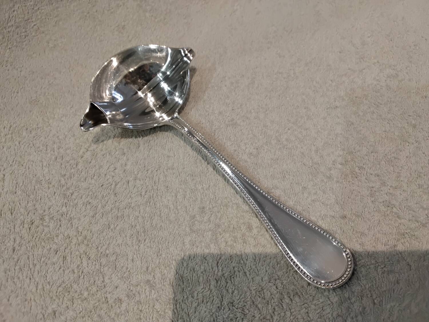 Ladle, fat or lean, silver-plated metal, Christofle silversmith, pearl pattern
