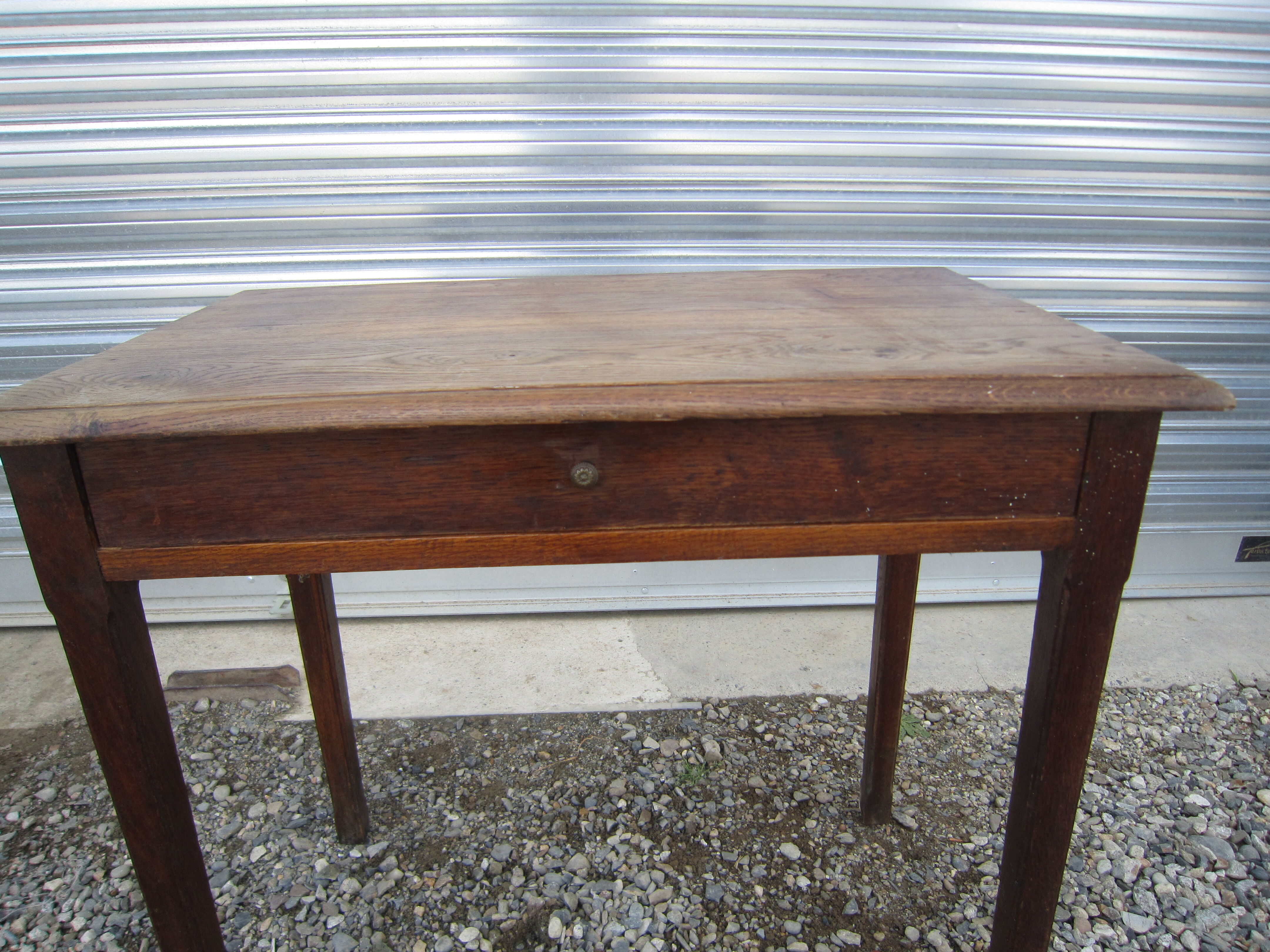 Wooden side table with drawer