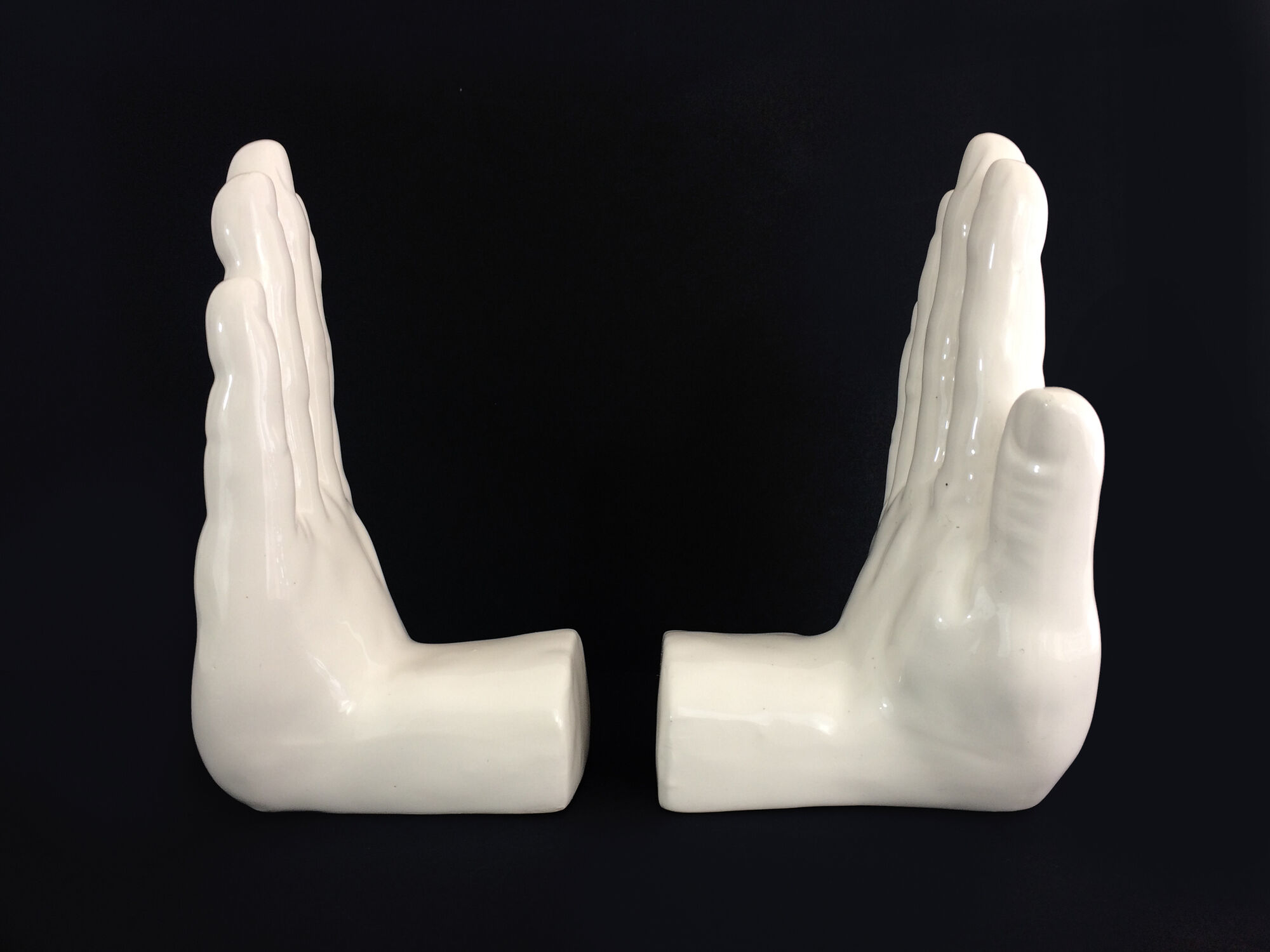 Pair of vintage handends in white ceramic to be used to comfort. Year 80