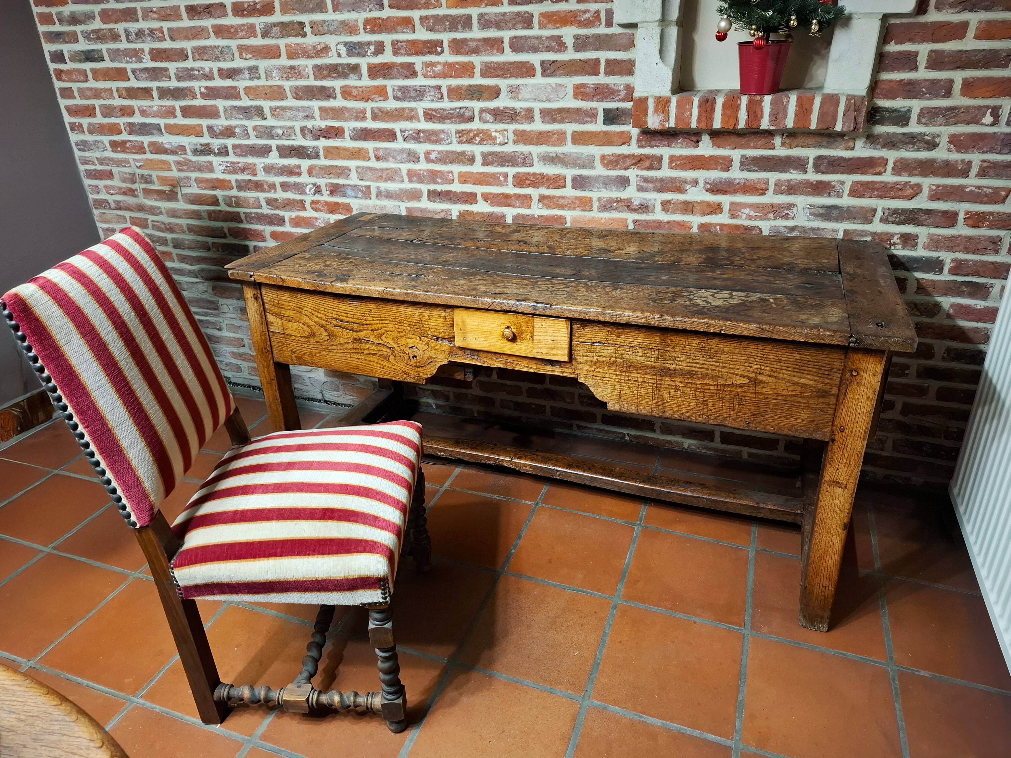 Antique desk accompanied by its chair – first half of the 18th century.