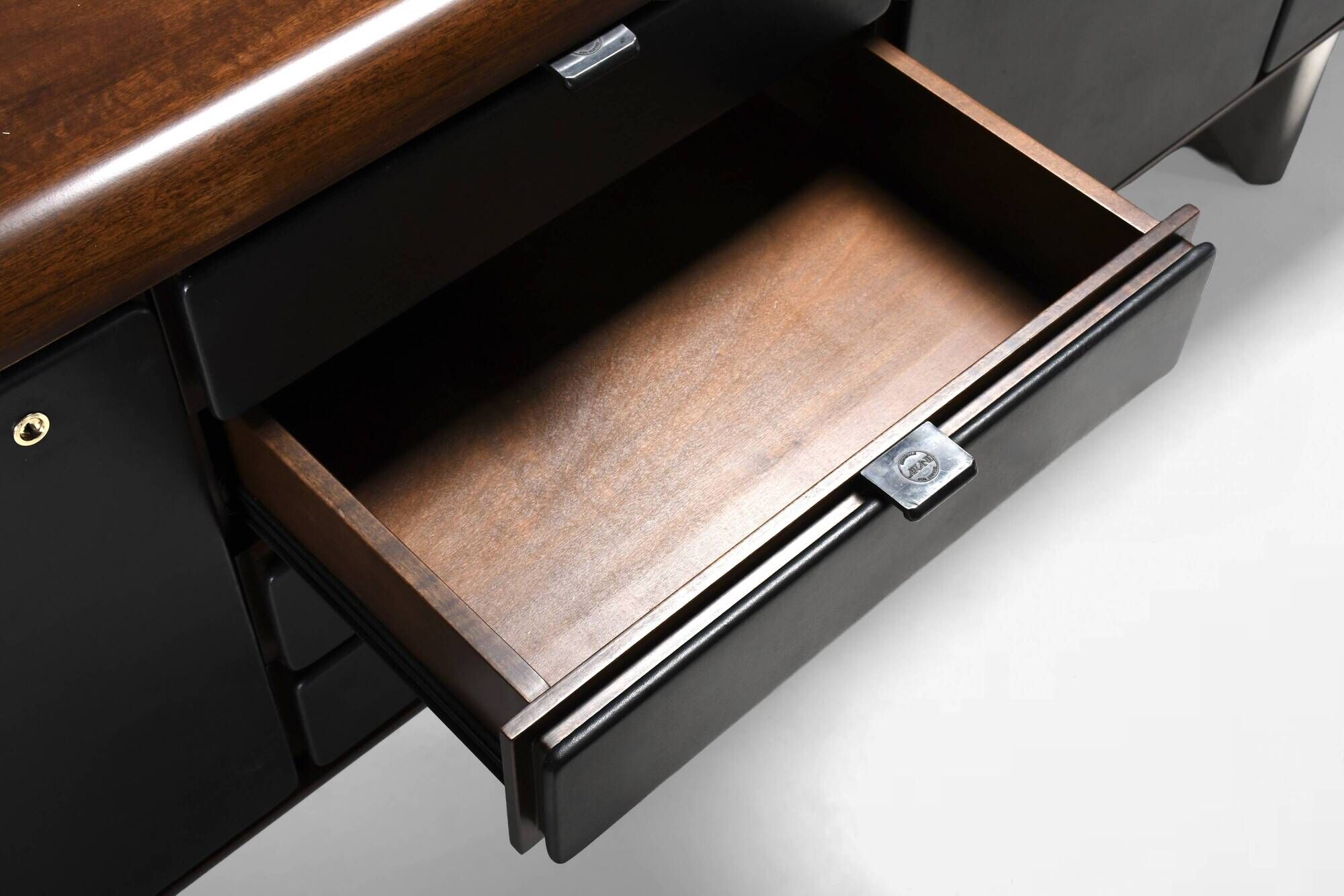 Walnut, metal and leather buffet by Hans von Klier “Il Ponte” for Skipper, 1970s.