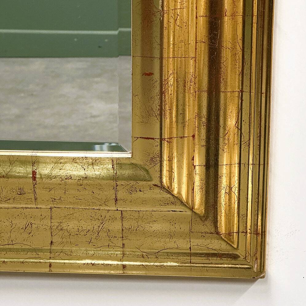 Very large Deknudt mirror with faux gold leaf frame, 1980s. Belgium