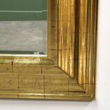 Very large Deknudt mirror with faux gold leaf frame, 1980s. Belgium