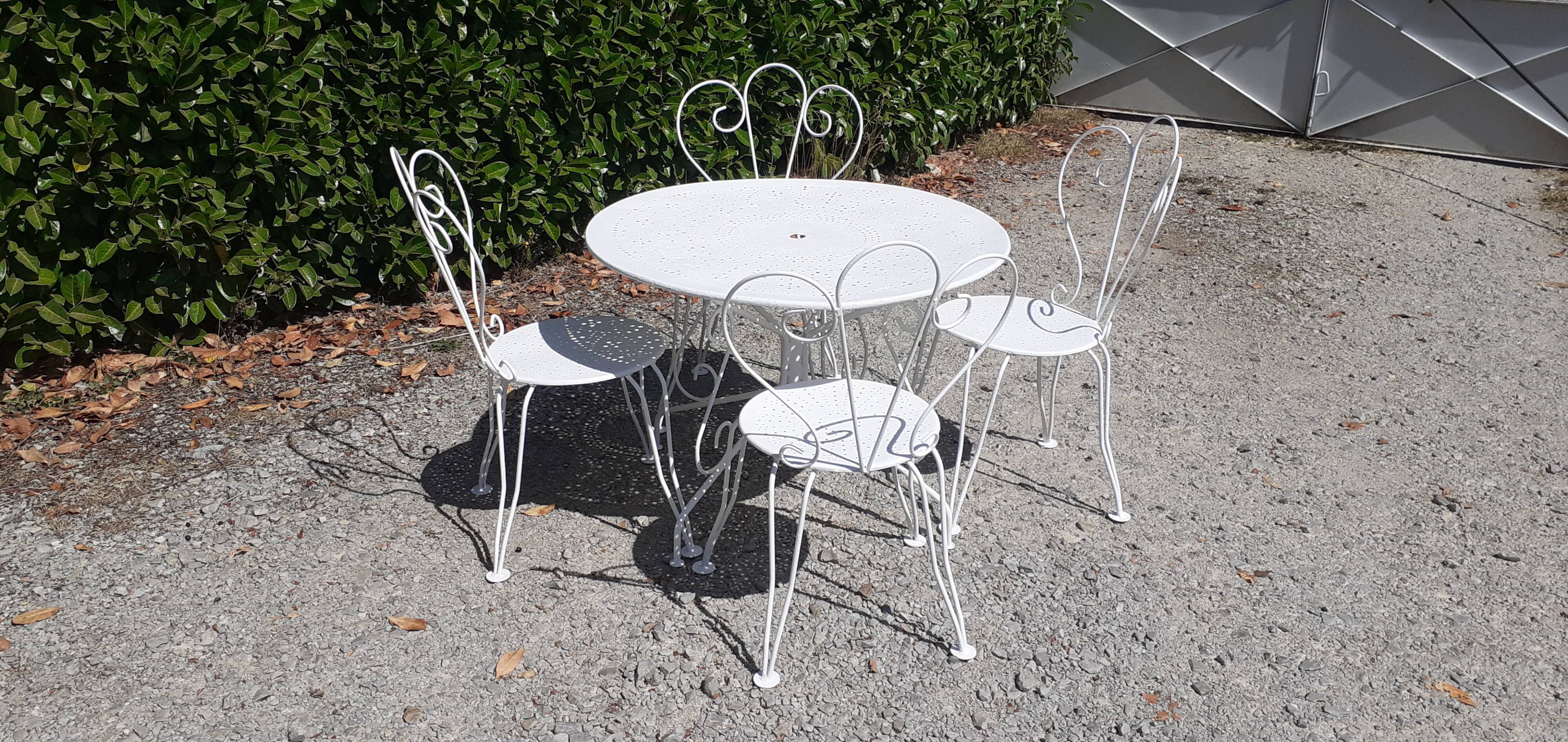 Old white wrought iron garden set