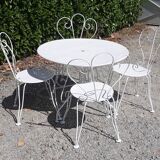 Old white wrought iron garden set