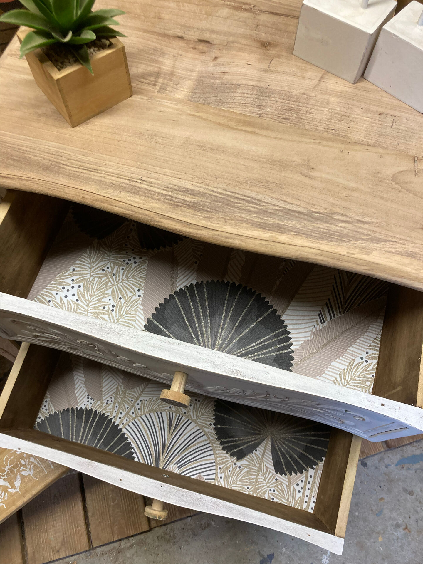 Adorable small chest of drawers or weathered white console.