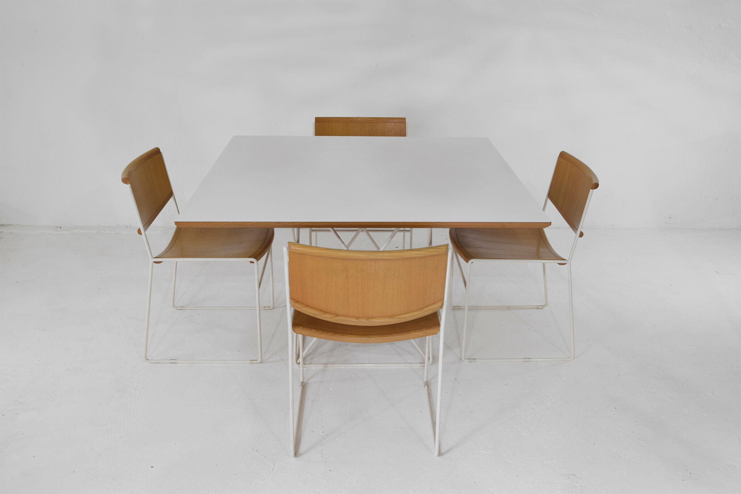 Minimalist Modernist dining set 4 wire chairs with maple wood and matching dining table,1980s