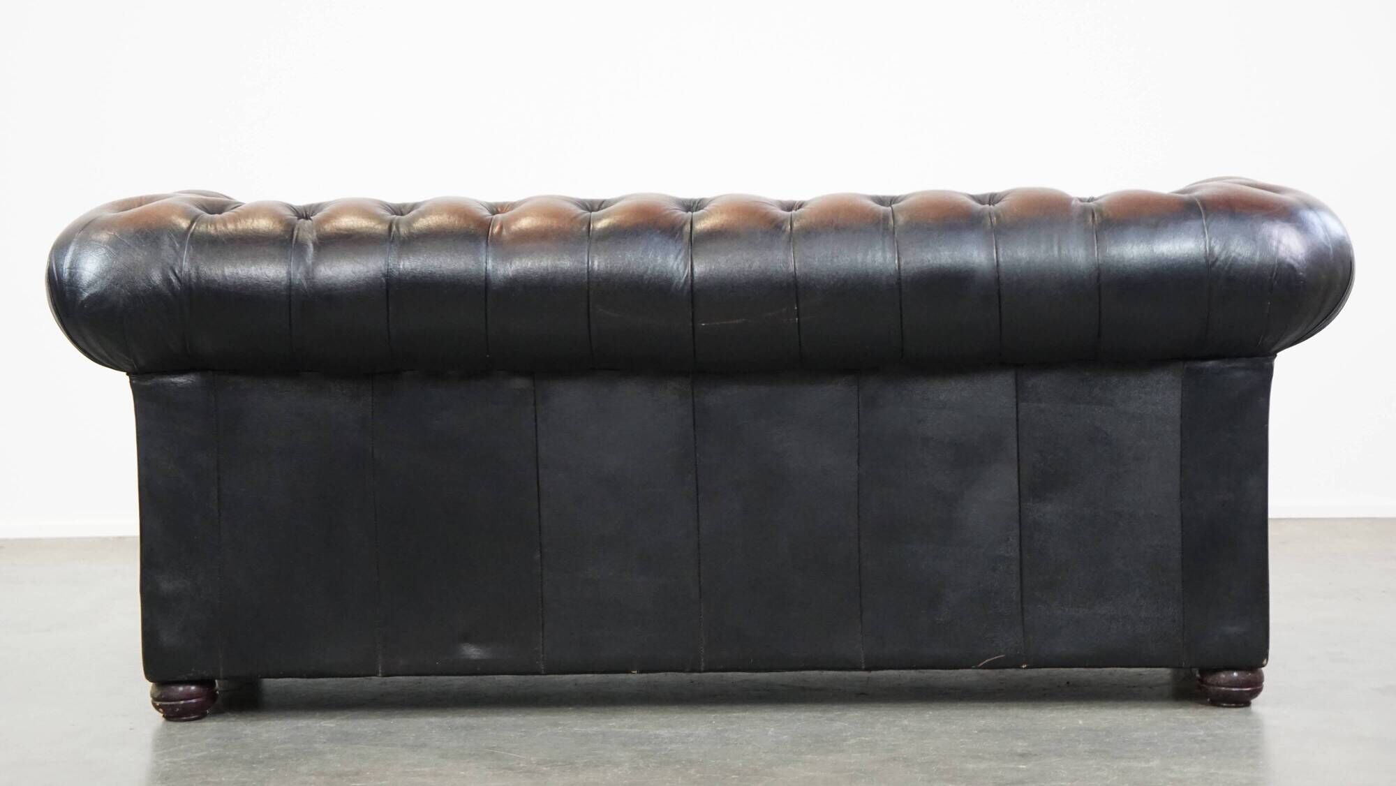 Classic English Chesterfield 2.5 seater sofa in brown cowhide