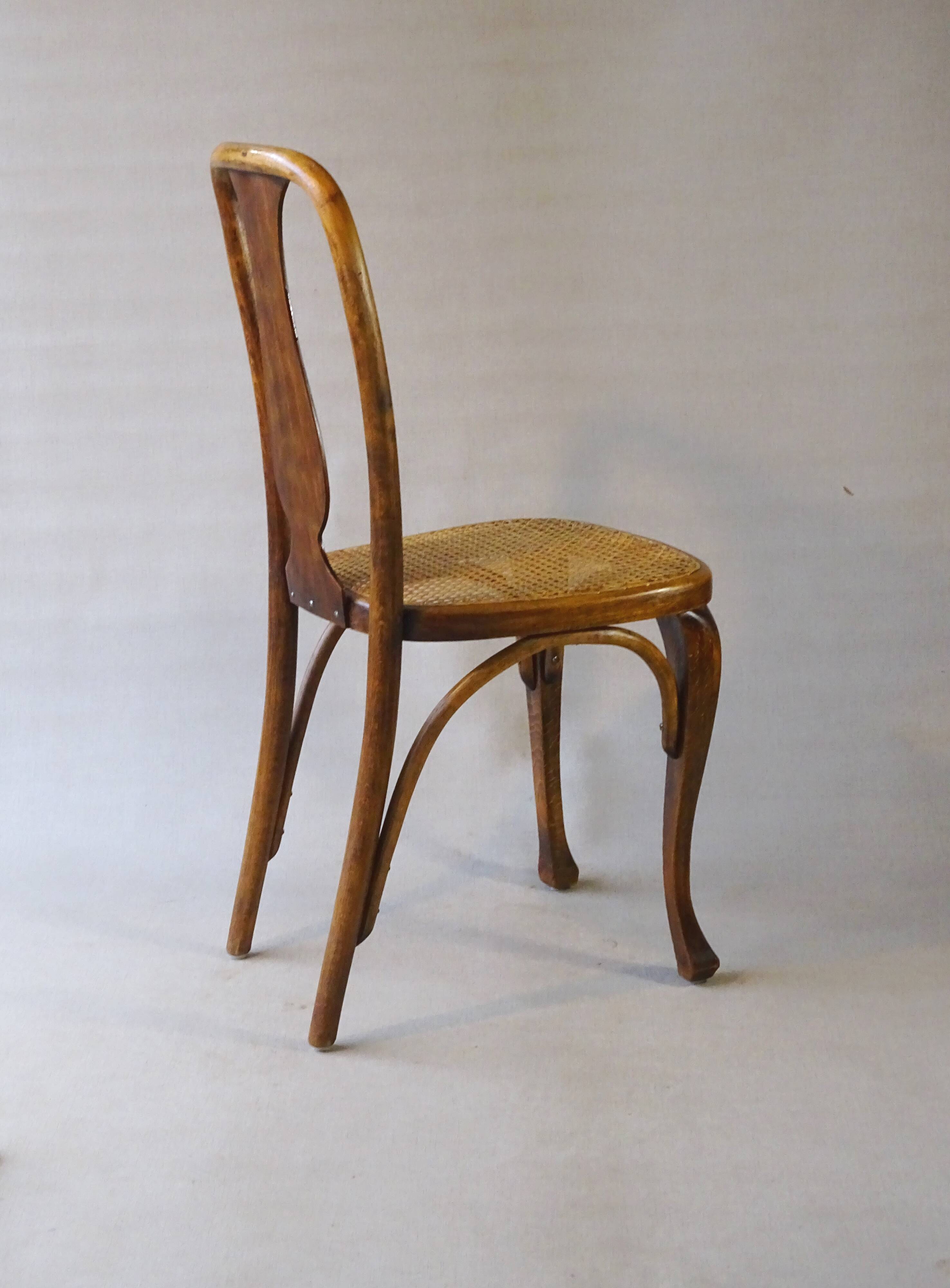 Two Kohn chairs, No. 529, circa 1910, bistro style, caned, bentwood