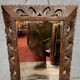Antique 19th-century carved oak mirror