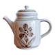 Antique coffee pot in handcrafted stoneware