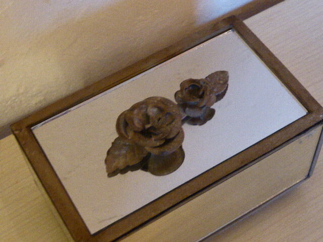 Jewelry box in mirror and metal