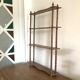 Turned wooden shelf