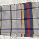 Light gray rectangle tablecloth with blue red yellow tiles