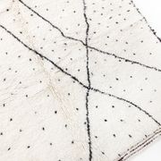 Beni Ouarain ecru Berber rug with polka dots and black patterns 235x157cm