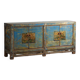 Old wooden entrance buffet in blue and yellow tones (circa 1920).