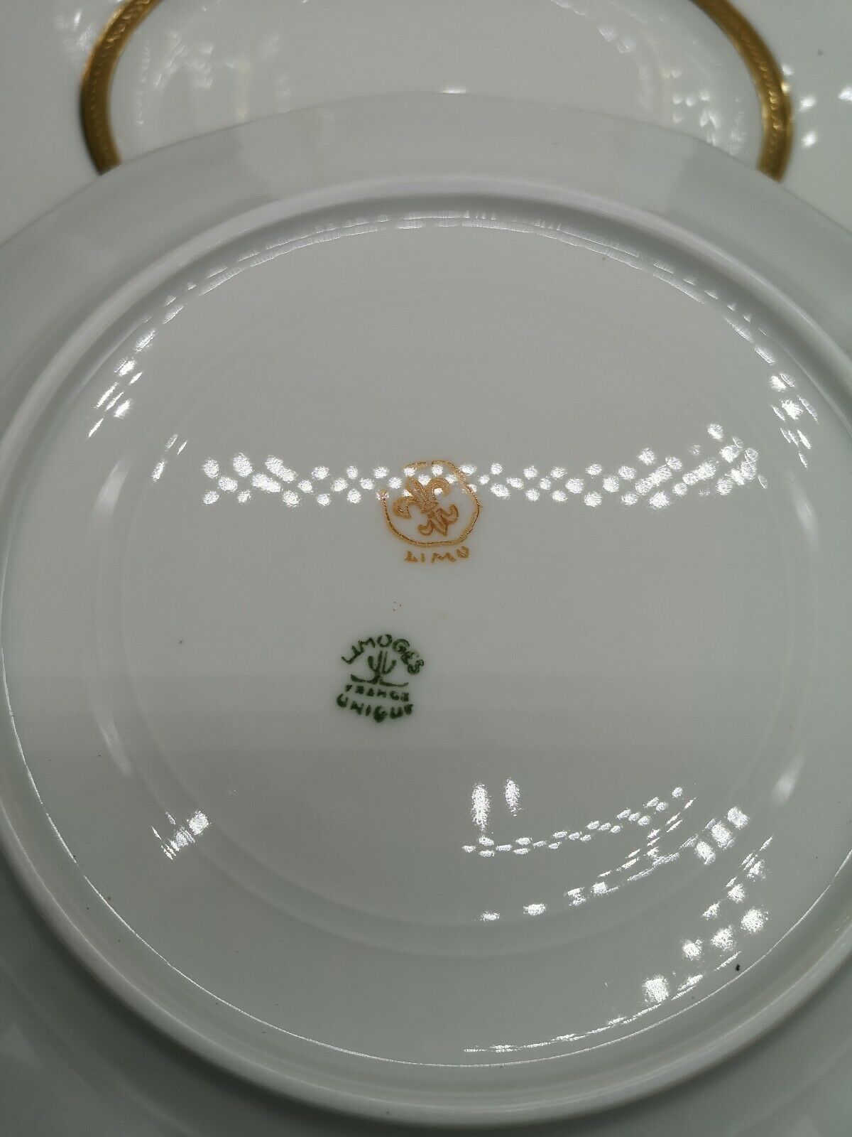 Lot of 4 porcelain dessert plates of white Limoges and double gilding