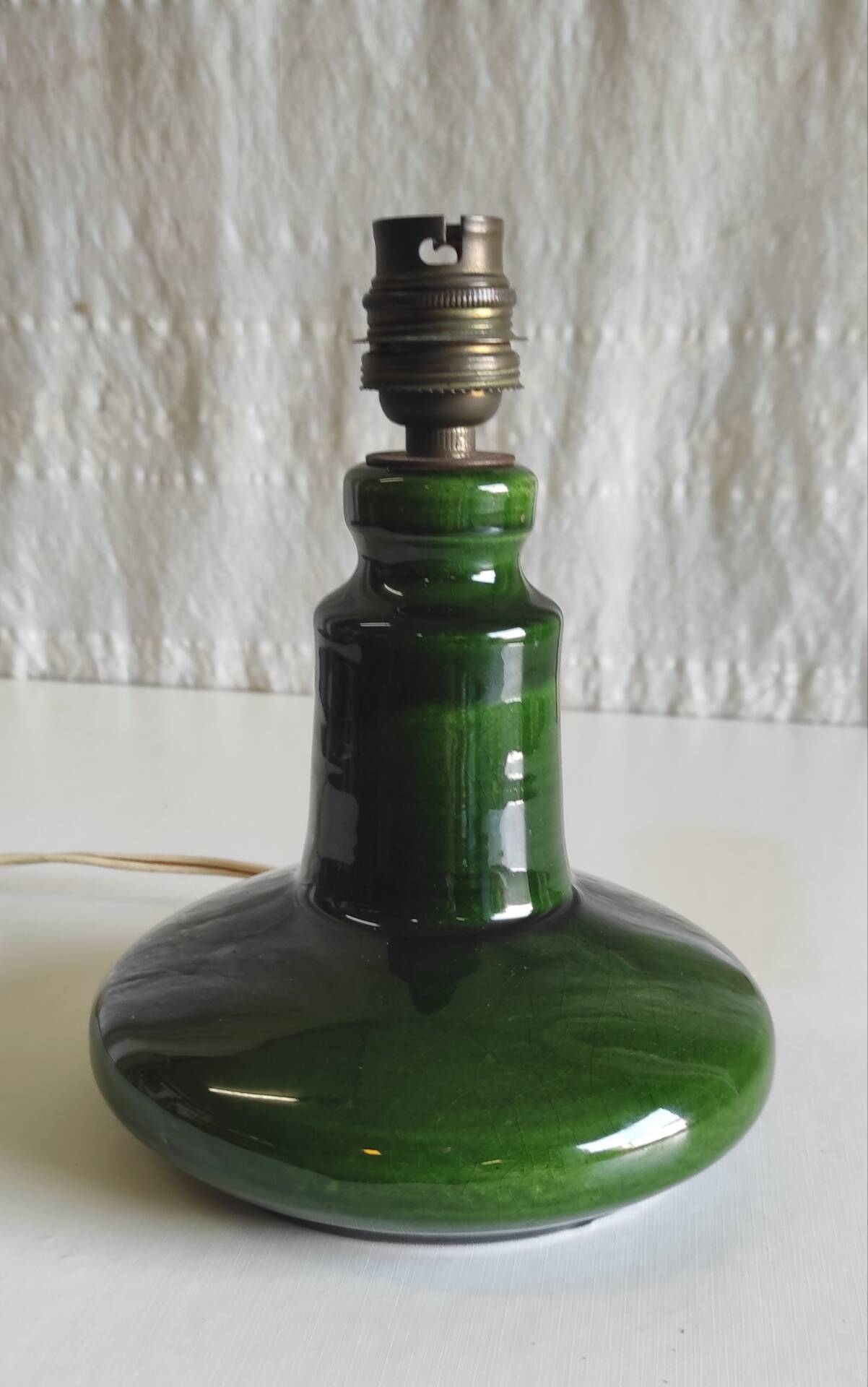 Green glazed ceramic table lamp base in Scandinavian style.
