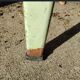 Pair of green factory-style bar stools.