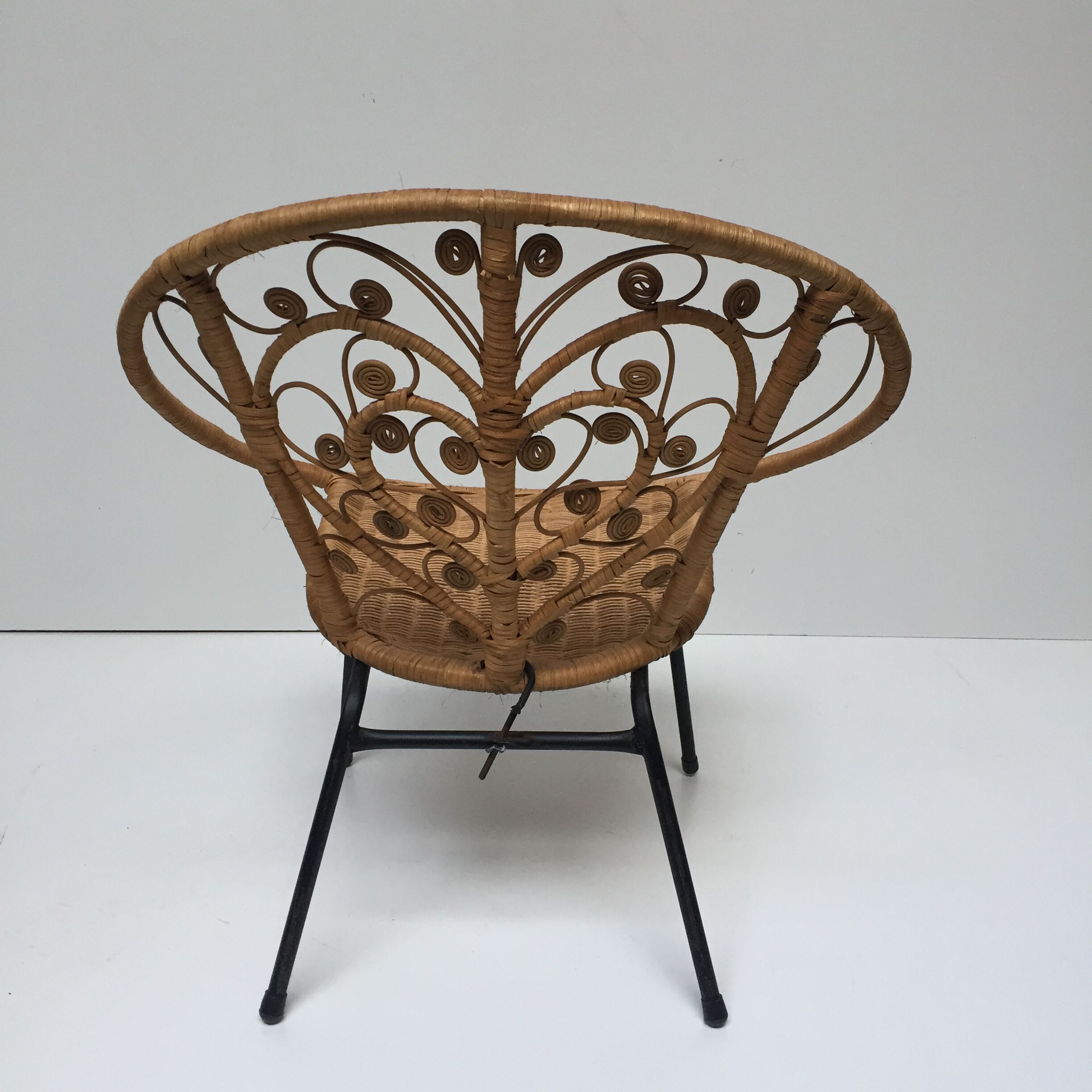 Vintage Bohemia volutes rattan chair
