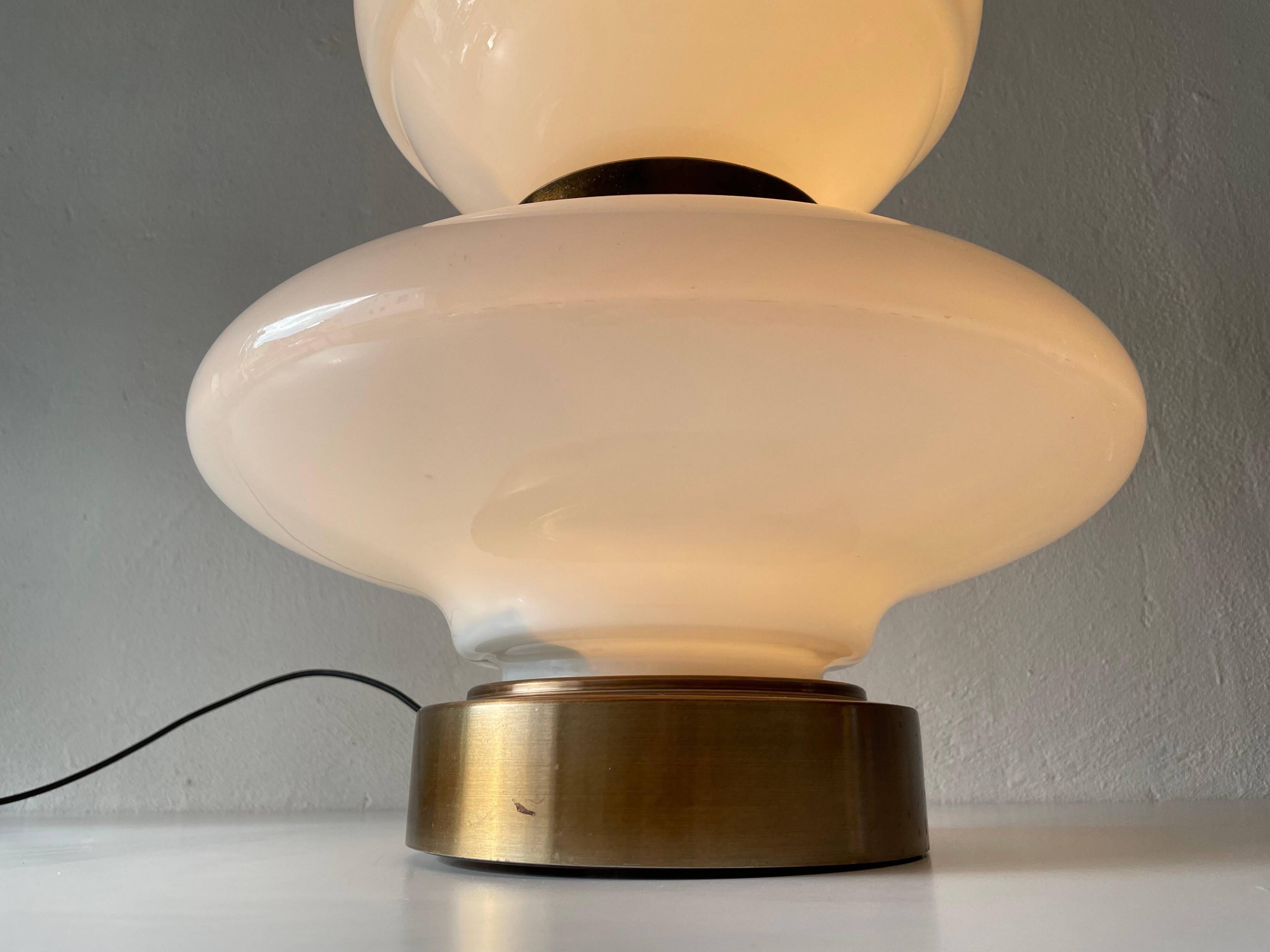 Large table lamp or floor lamp in opal glass and brass body, 1960s, Italy.