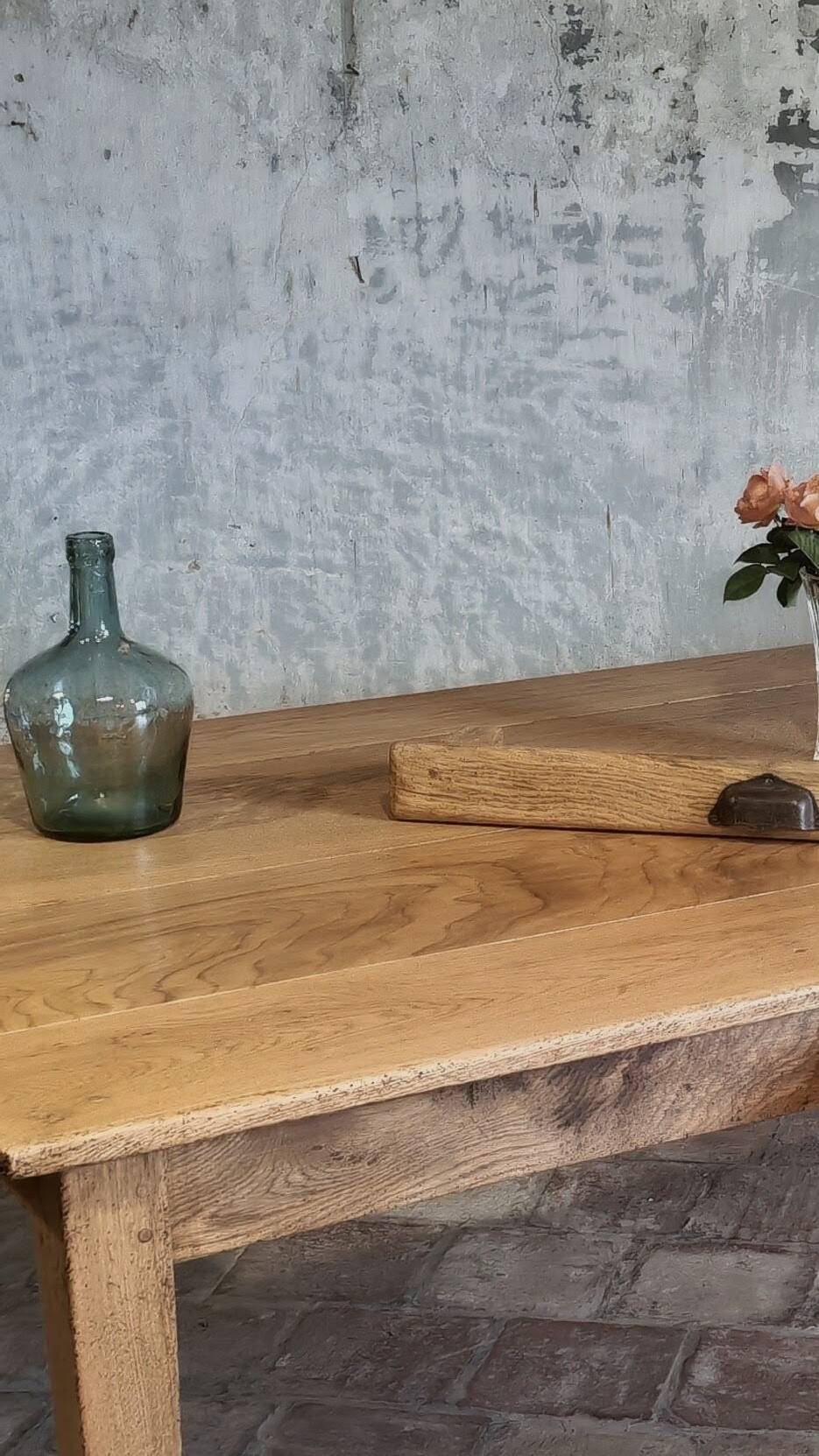 Large authentic farmhouse table made of solid French oak.