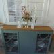 English sideboard, shallow, smoky green, wooden top.